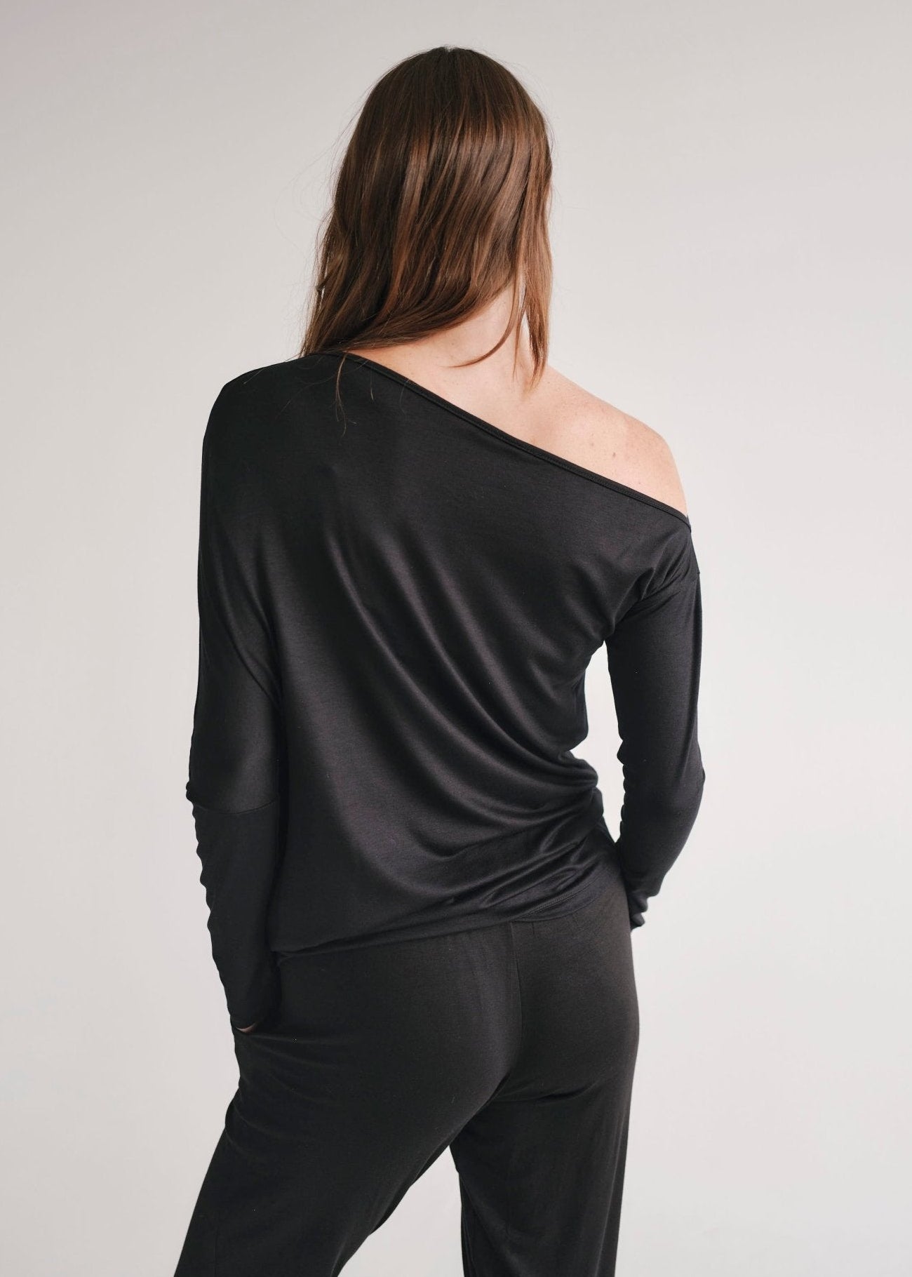 View our Long Sleeved Off The Shoulder Classic Top In Black - by Tribute Store
