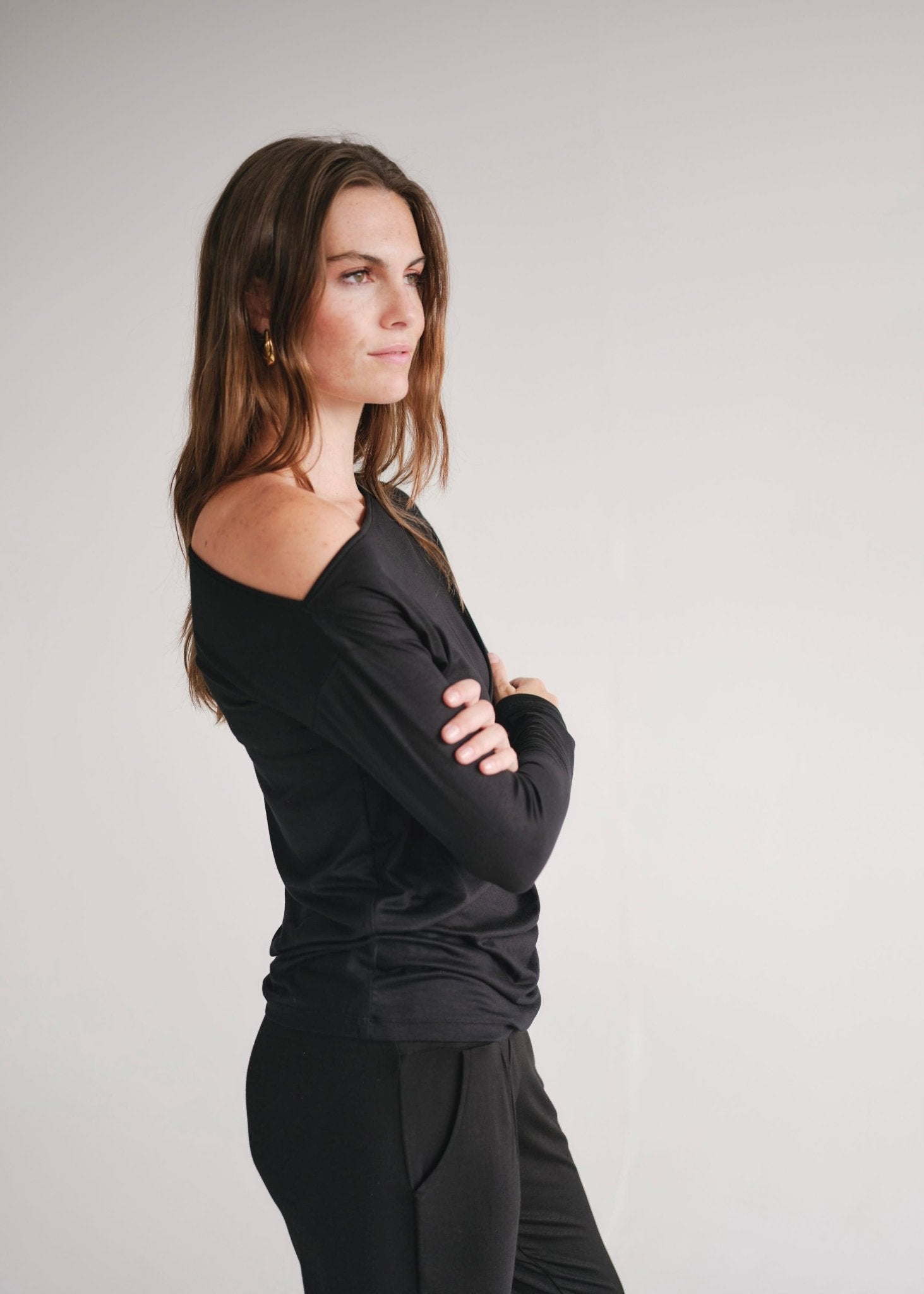 View our Long Sleeved Off The Shoulder Classic Top In Black - by Tribute Store