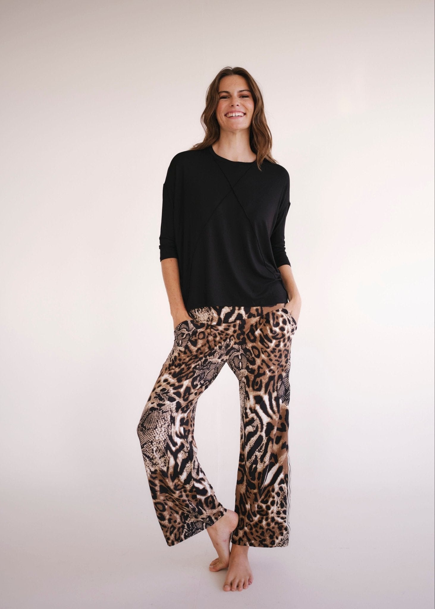 View our Lucie Tee With Seam Detail In Black - by Tribute Store