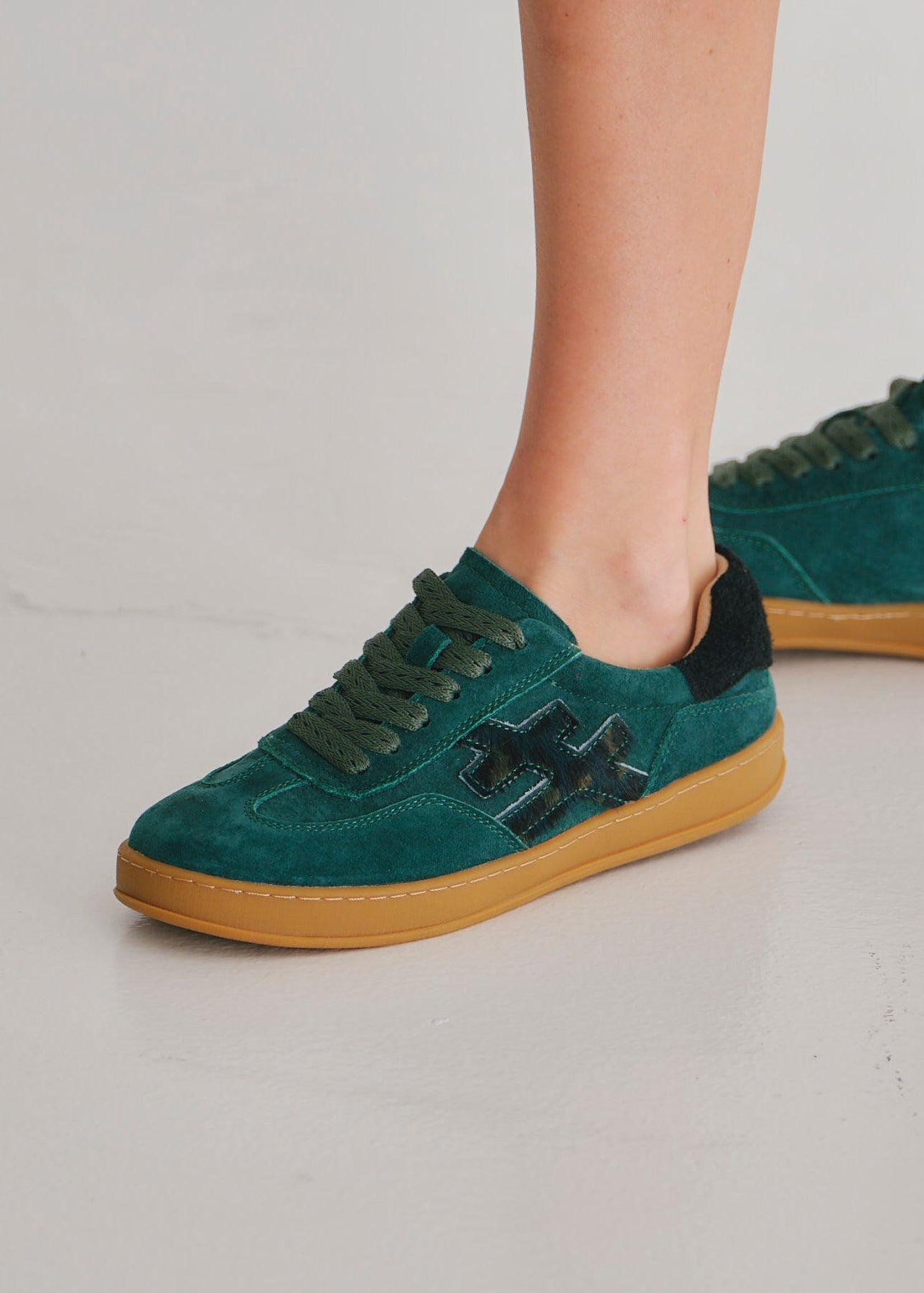 View our Lumi Leather Sneaker In Emerald And Black - by Tribute Store