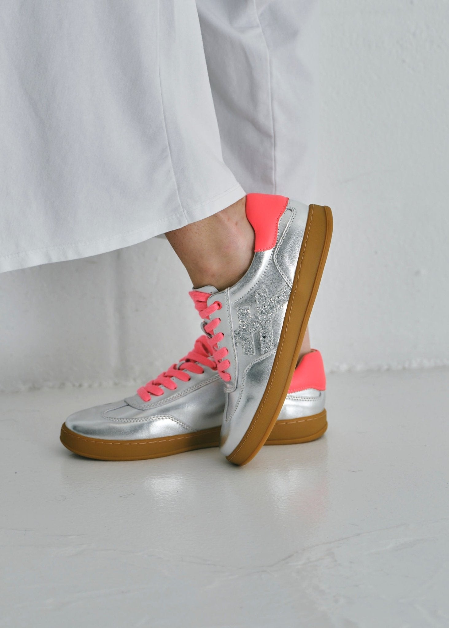 View our Lumi Leather Sneaker In Silver And Hot Pink - by Tribute Store