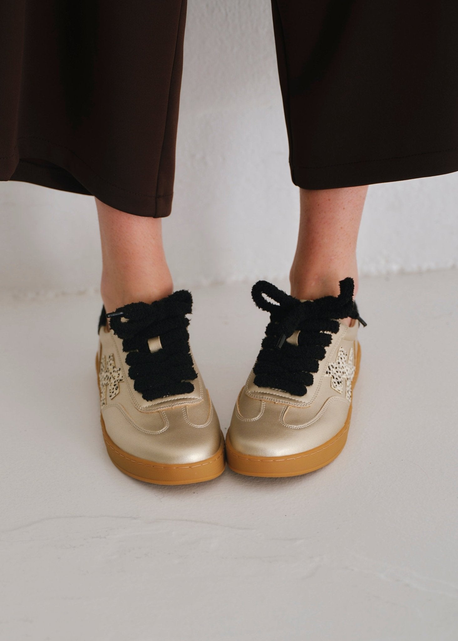 View our Lumi Leather Sneaker With Cheetah Print In Gold And Black - by Tribute Store