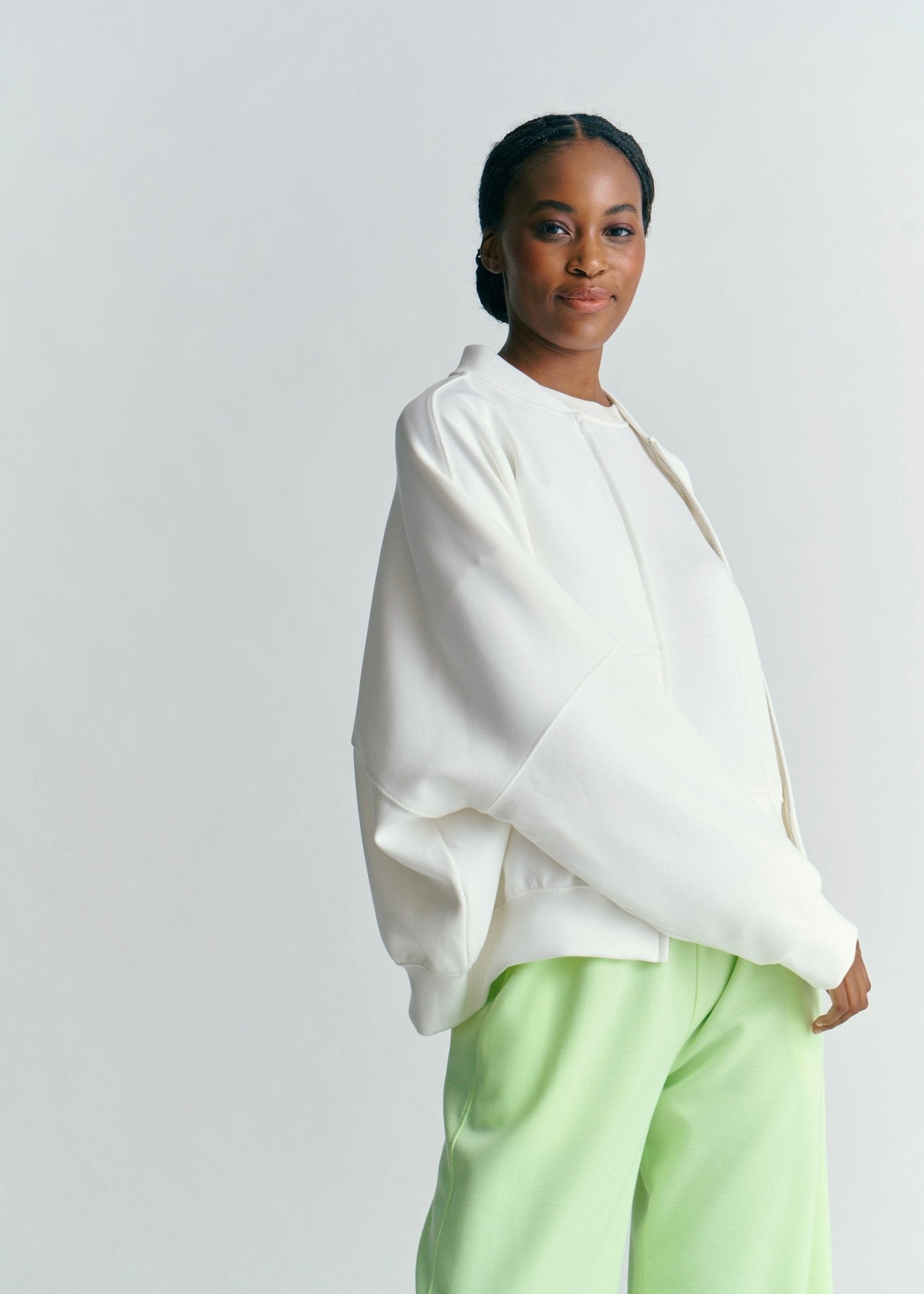 View our Malmö Oversized Zip Up Bomber Jacket In White - by Tribute Store