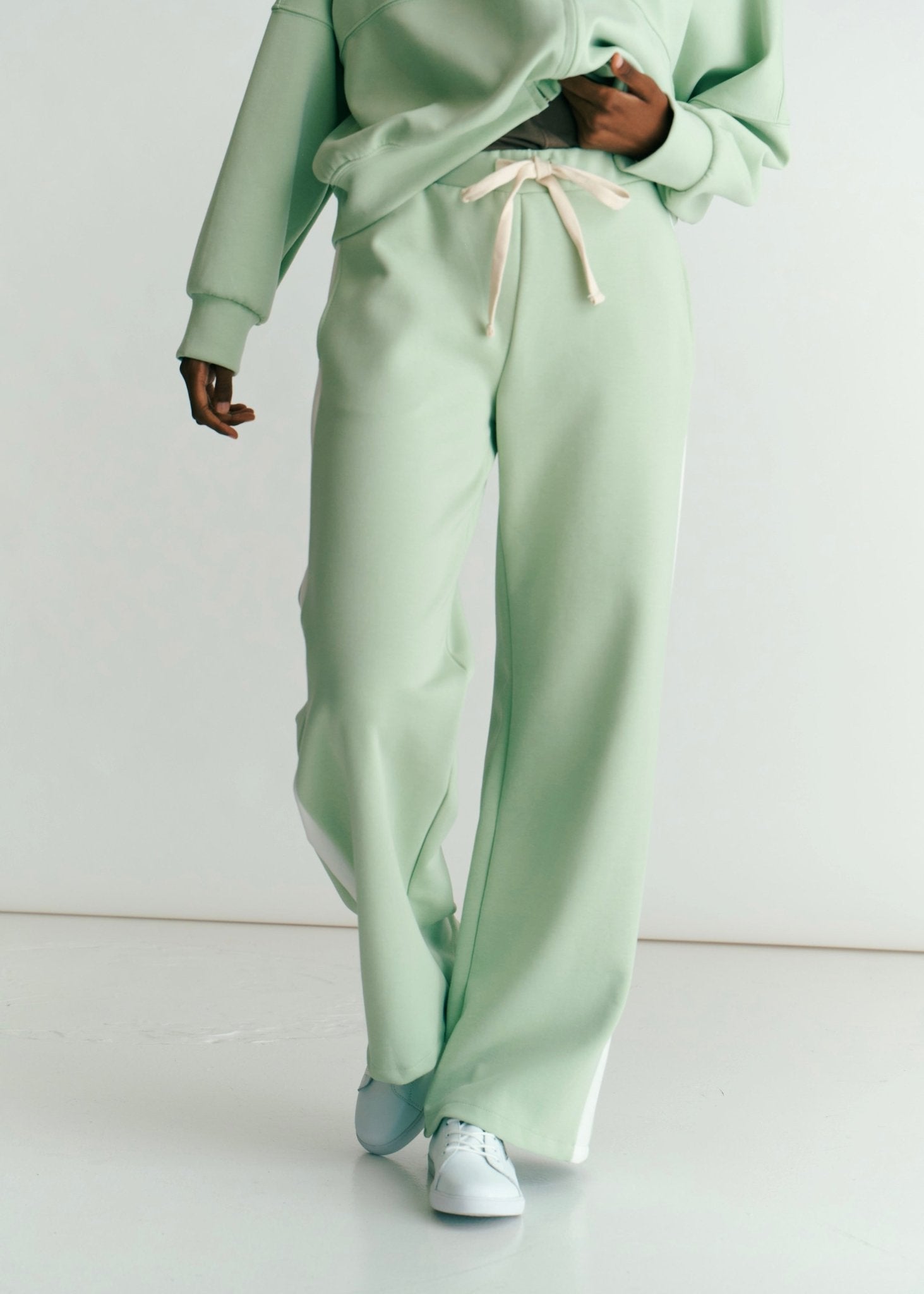 View our Malmö Palazzo Track Pants With White Seam In Mint Green - by Tribute Store