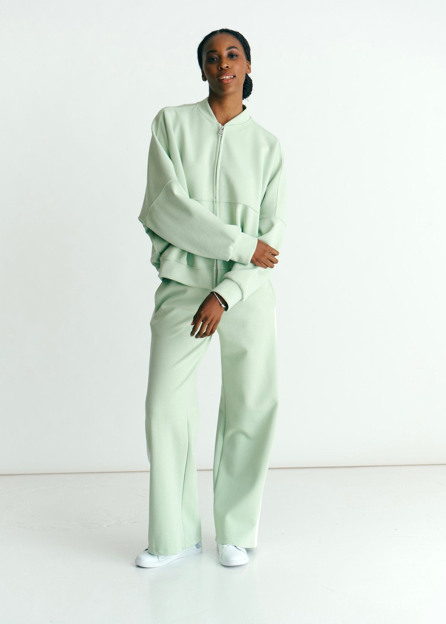 View our Malmö Palazzo Track Pants With White Seam In Mint Green - by Tribute Store