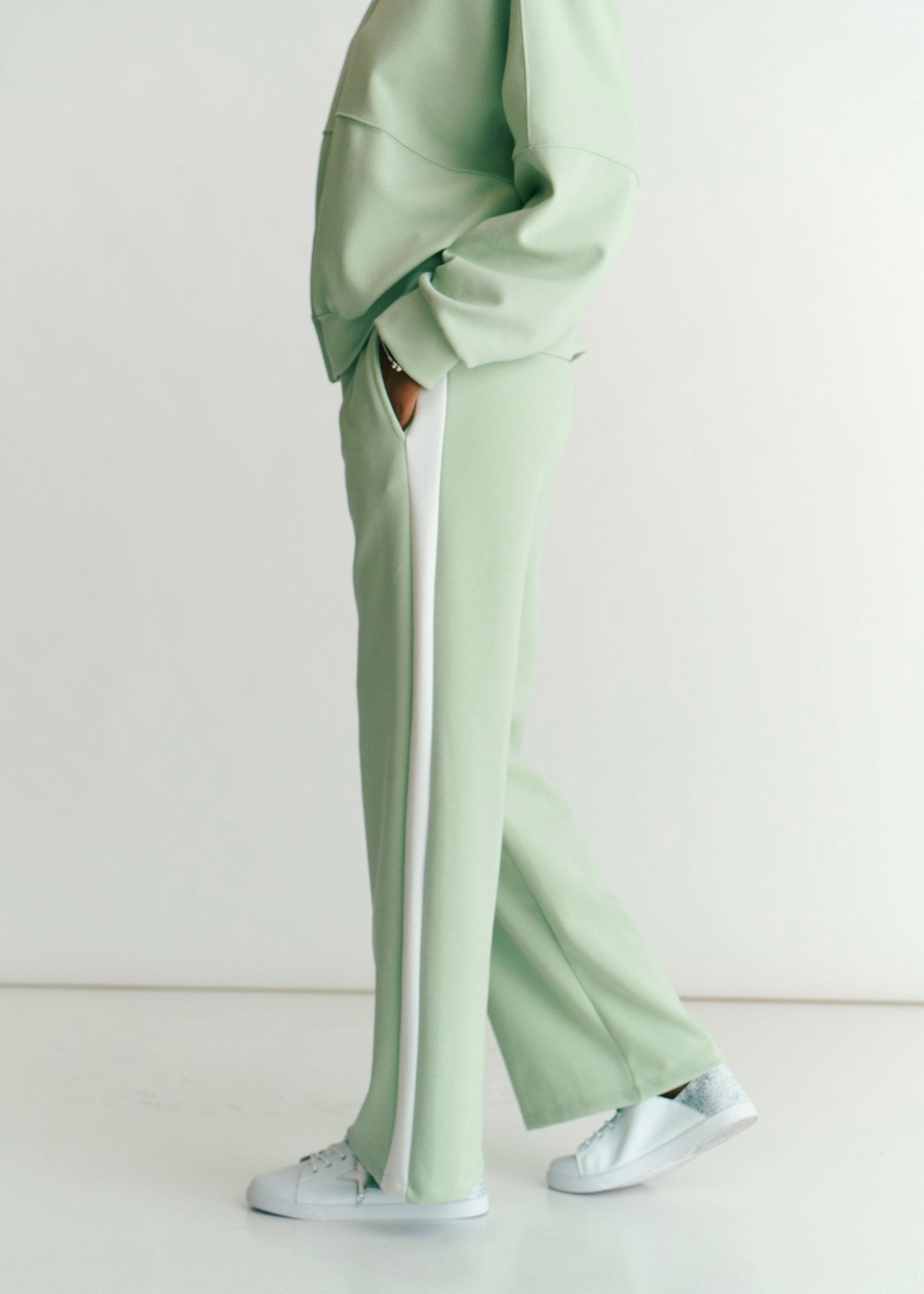 View our Malmö Palazzo Track Pants With White Seam In Mint Green - by Tribute Store