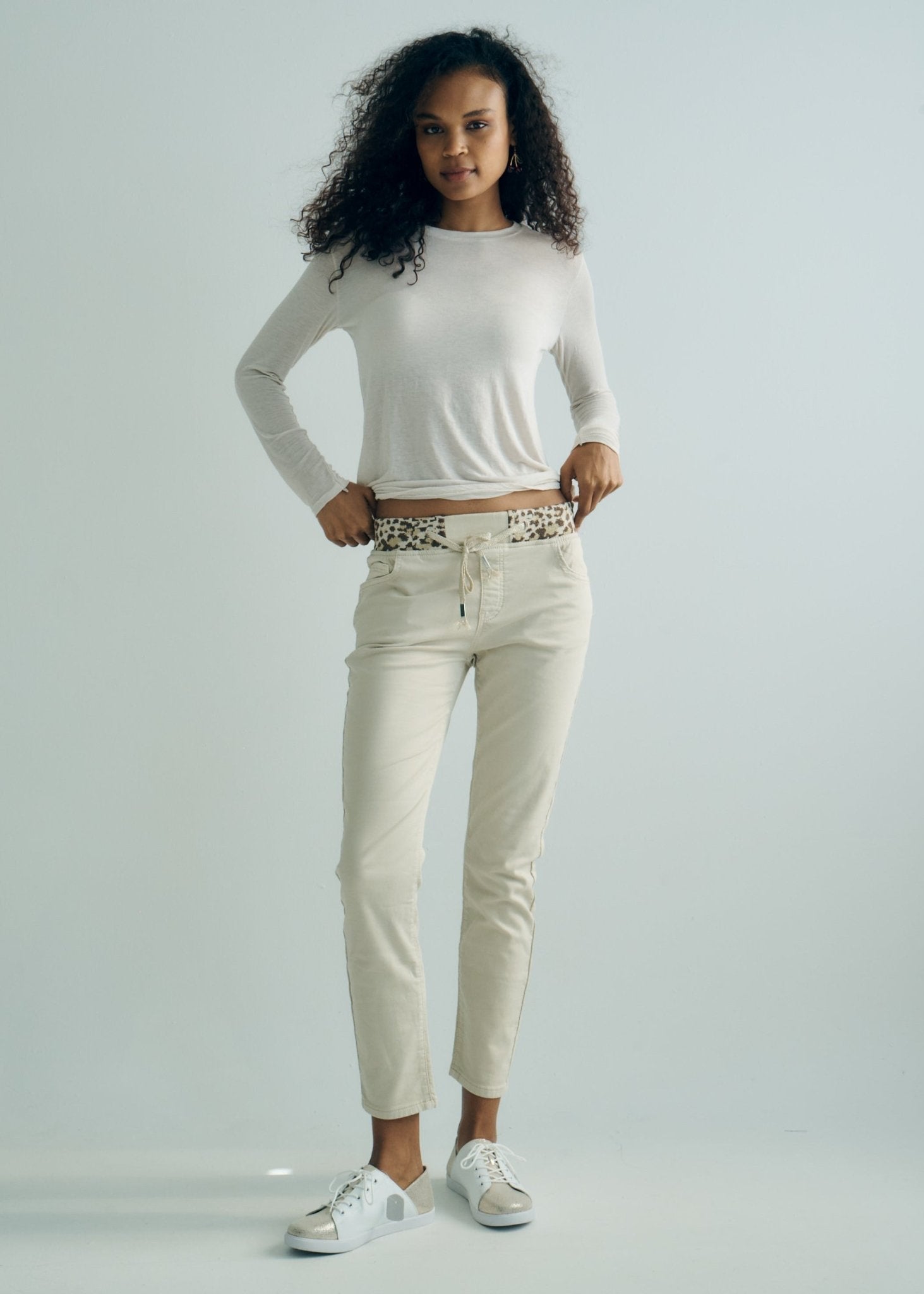 View our Mid - Rise Cotton Jogger Jeans in Beige with Animal Print Waist Band - by Tribute Store