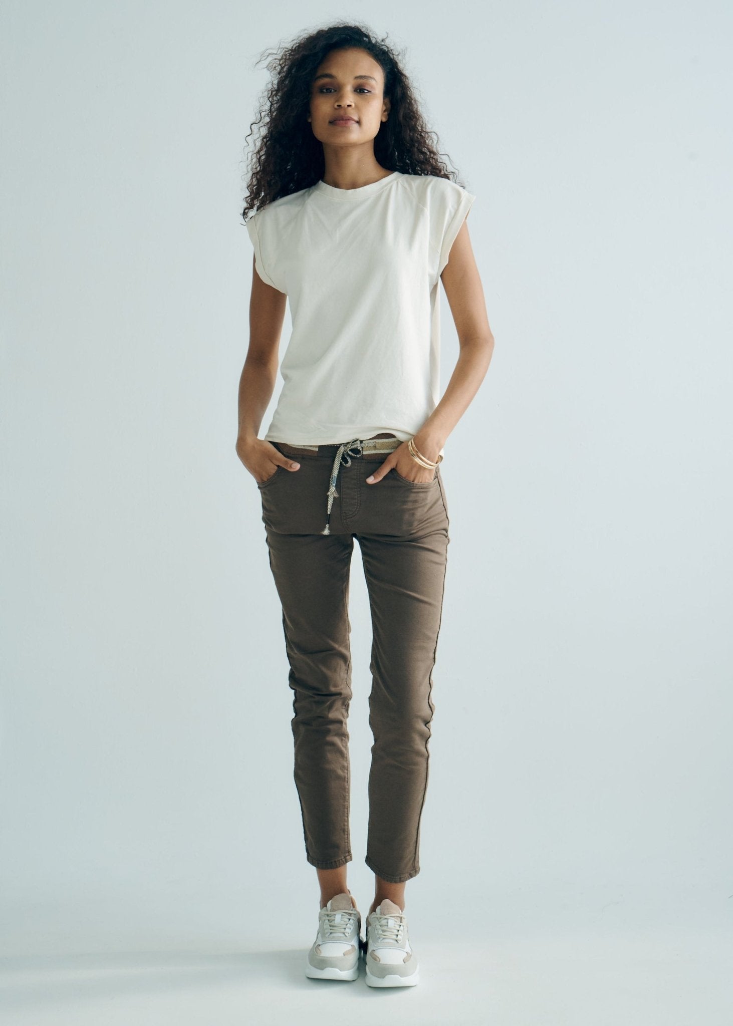 View our Mid - Rise Cotton Jogger Jeans in Chocolate with Gold Waist Band - by Tribute Store