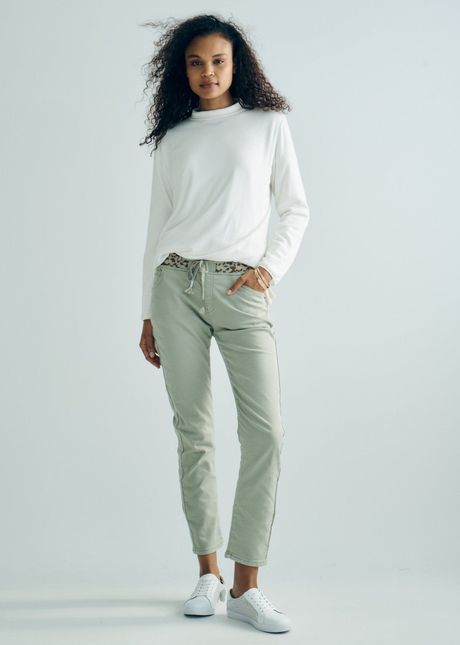 View our Mid - Rise Cotton Jogger Jeans in Khaki with Animal Print Waist Band - by Tribute Store