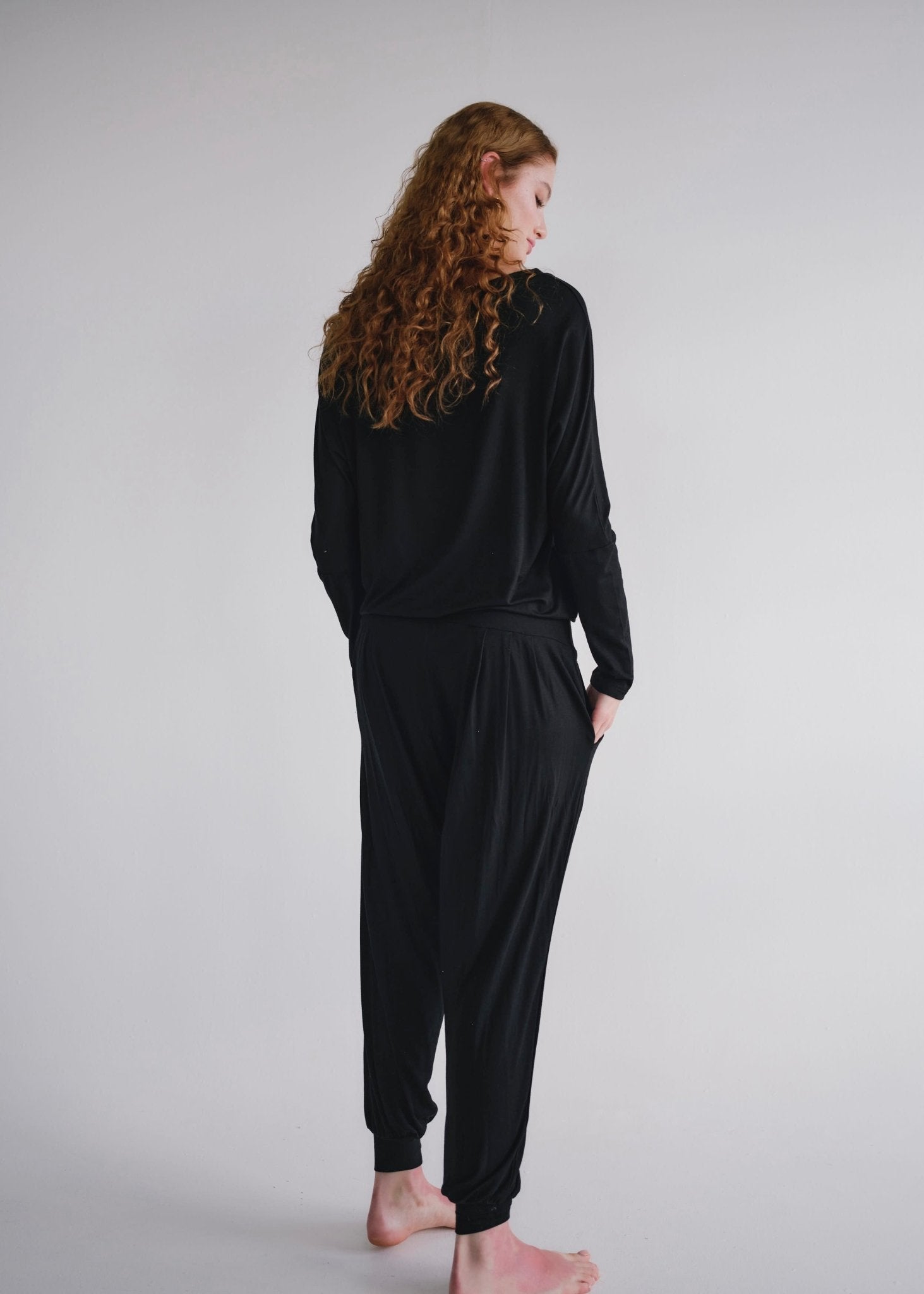 View our Mila Lounge Jumpsuit In Black - by Tribute Store