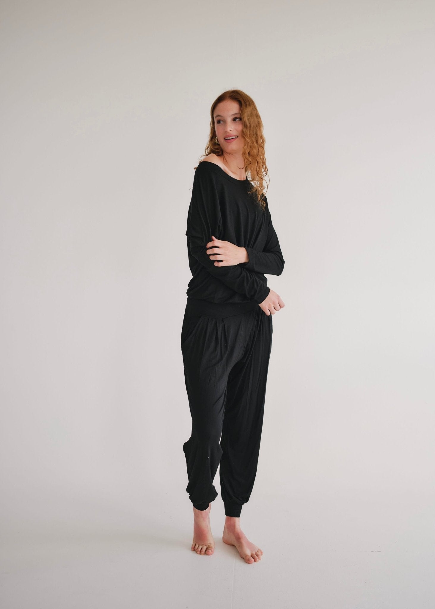 View our Mila Lounge Jumpsuit In Black - by Tribute Store