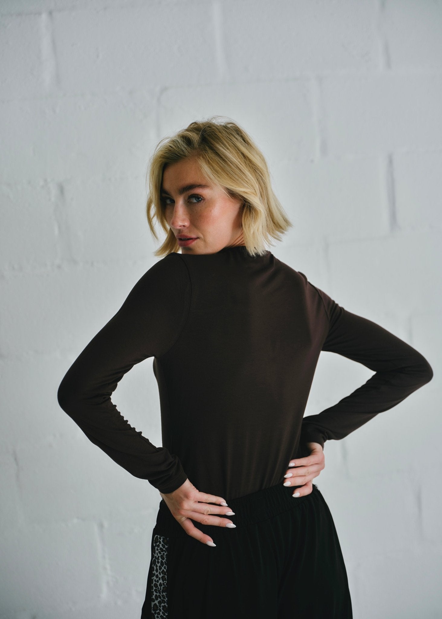 View our Milla Twisted Cut - Out Long Sleeve Top Brown - by Tribute Store