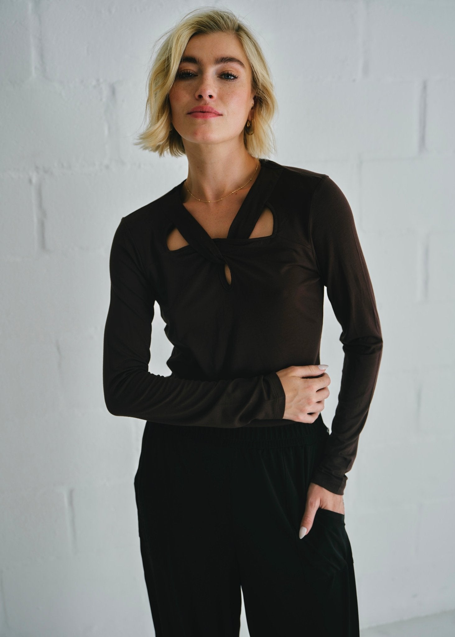 View our Milla Twisted Cut - Out Long Sleeve Top Brown - by Tribute Store