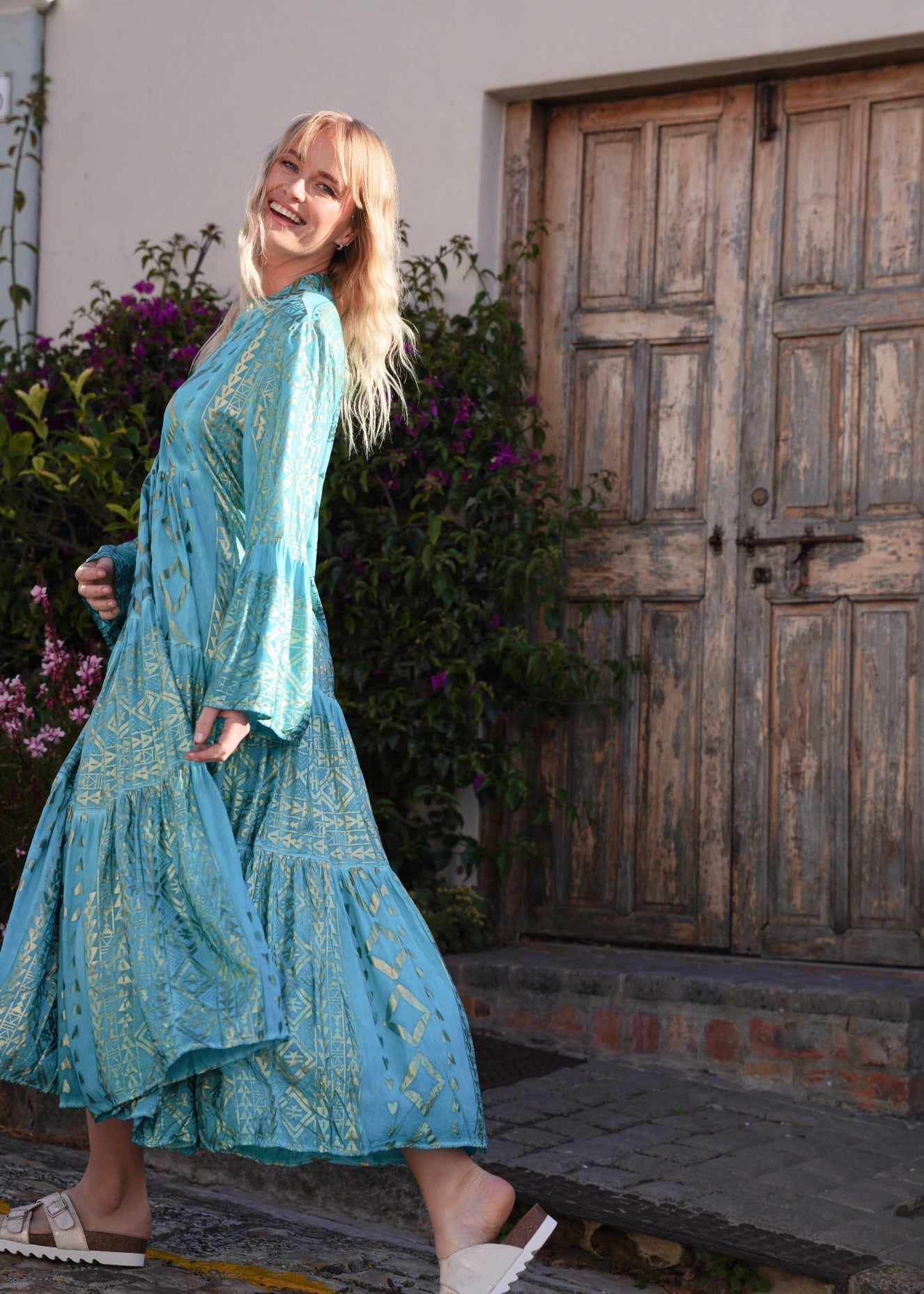 View our Phoebe Bohemian Maxi Dress with Gold Foil in Aqua Blue - by Tribute Store