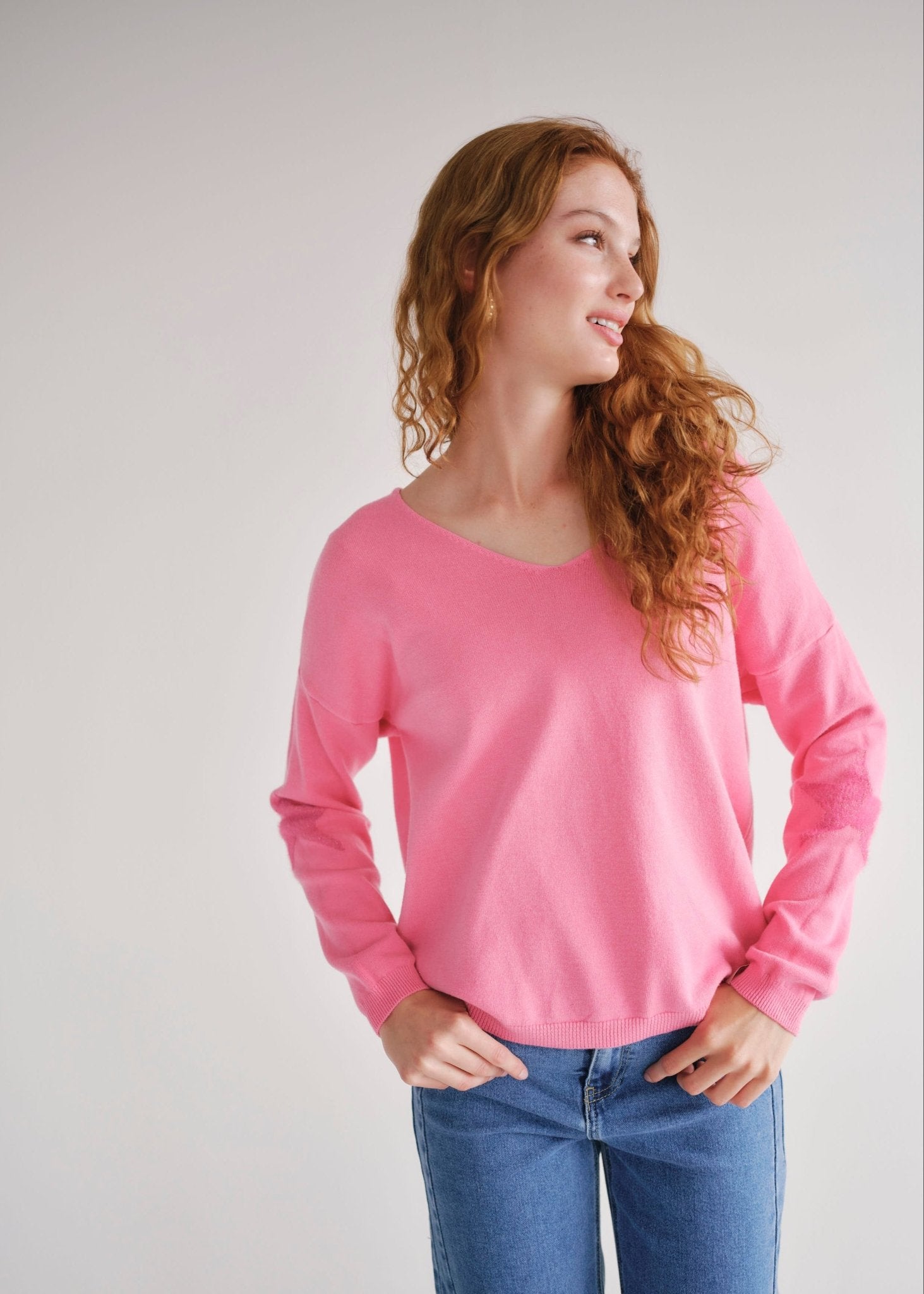 View our Pink V Neck knit with Star on Elbow - by Tribute Store
