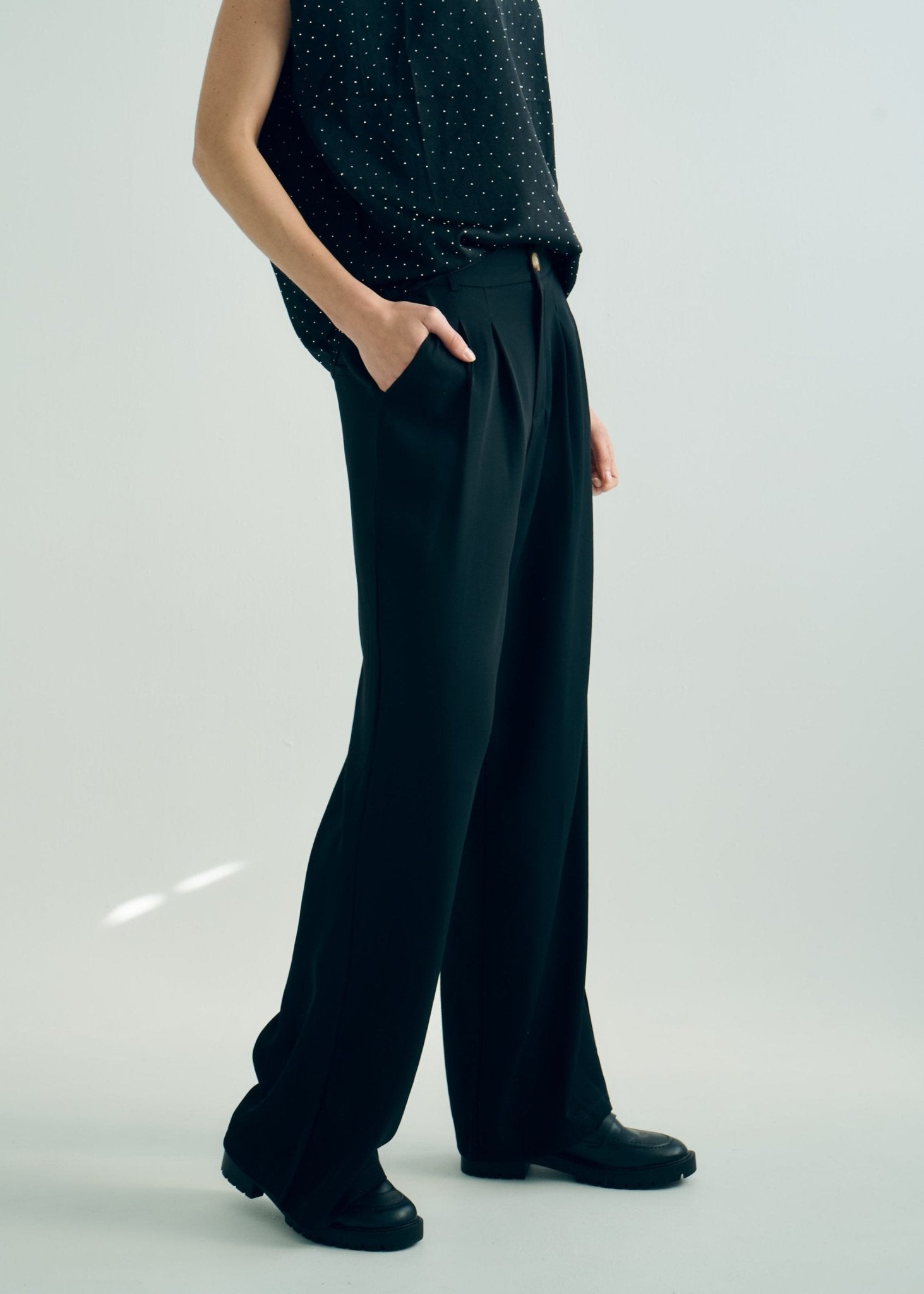 View our Pleated Trousers in Black - by Tribute Store