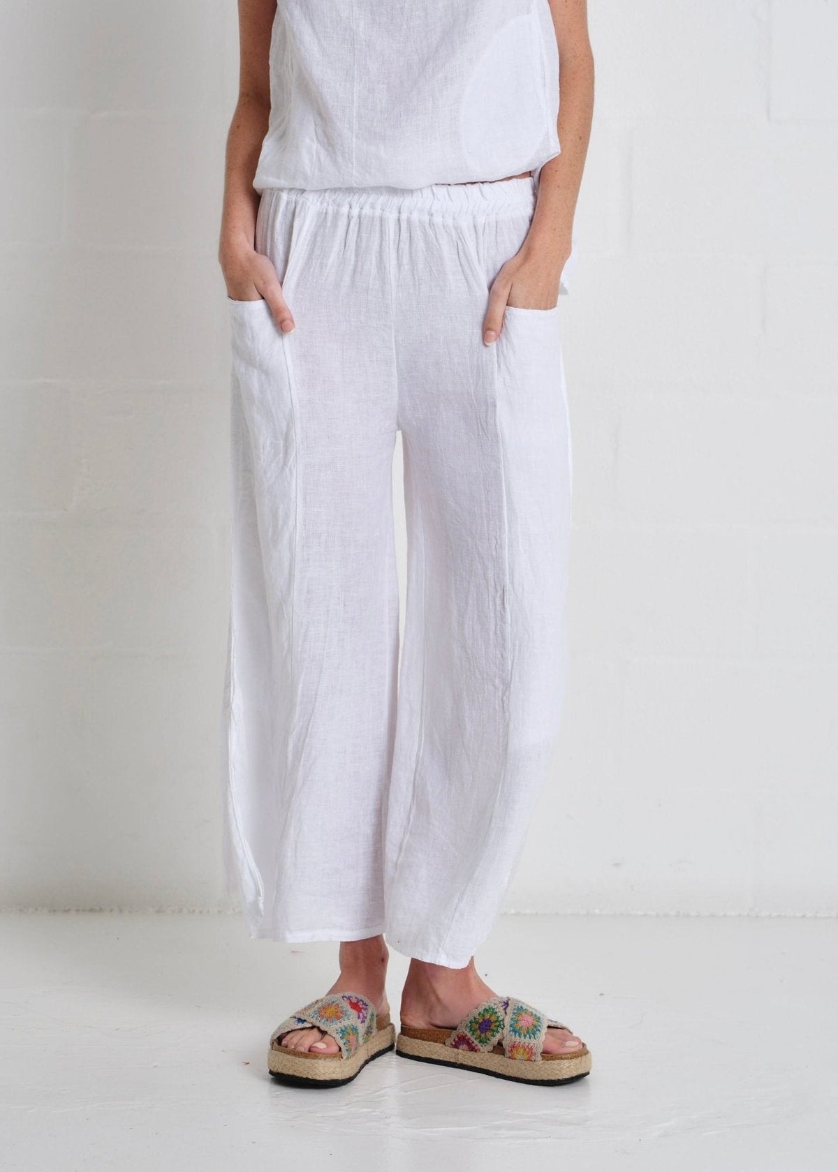 View our Portofino Side Slit Palazzo Pants In White - by Tribute Store