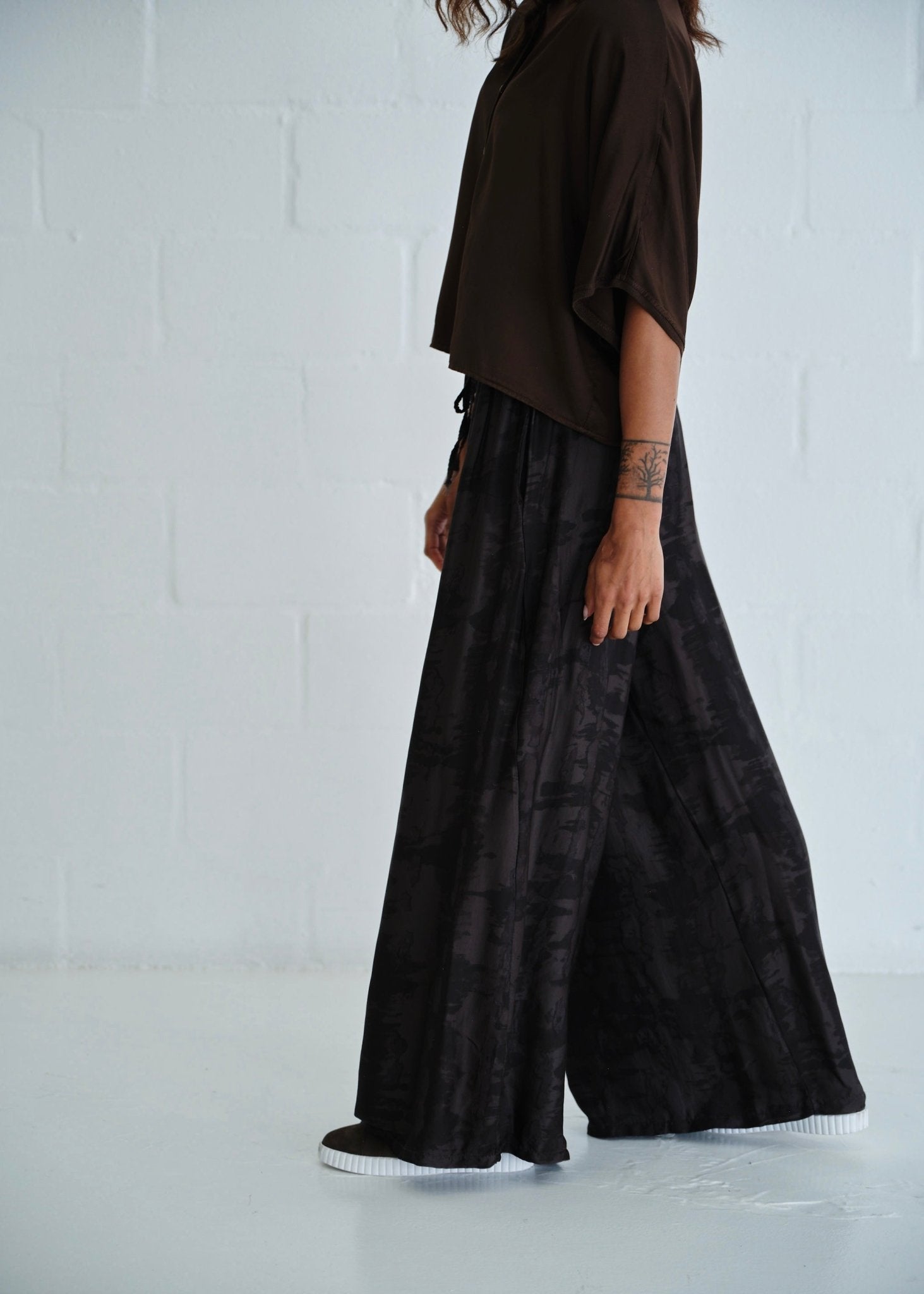 View our Satin Feel Palazzo Pants With Animal Print In Chocolate - by Tribute Store