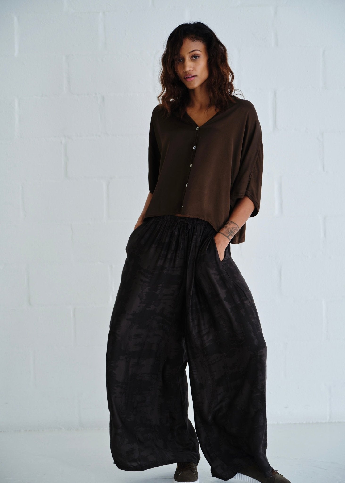View our Satin Feel Palazzo Pants With Animal Print In Chocolate - by Tribute Store