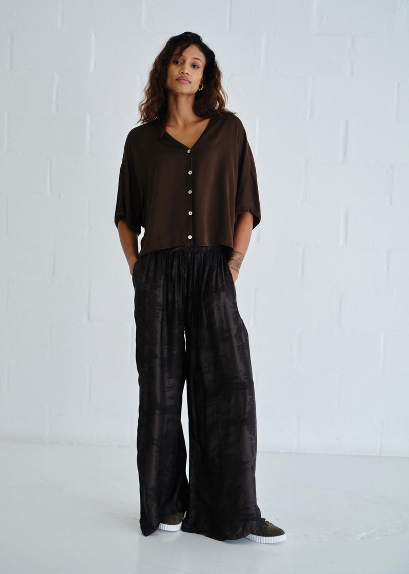 View our Satin Feel Palazzo Pants With Animal Print In Chocolate - by Tribute Store