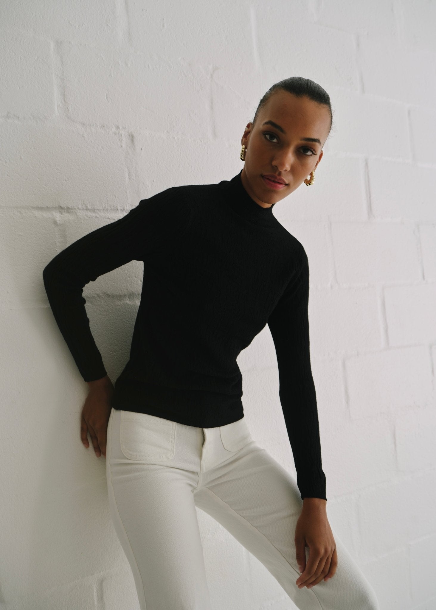 View our The Essential Black Embossed Turtleneck Knit - by Tribute Store