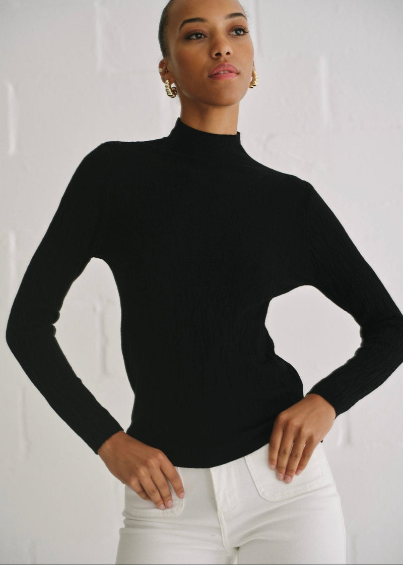 View our The Essential Black Embossed Turtleneck Knit - by Tribute Store