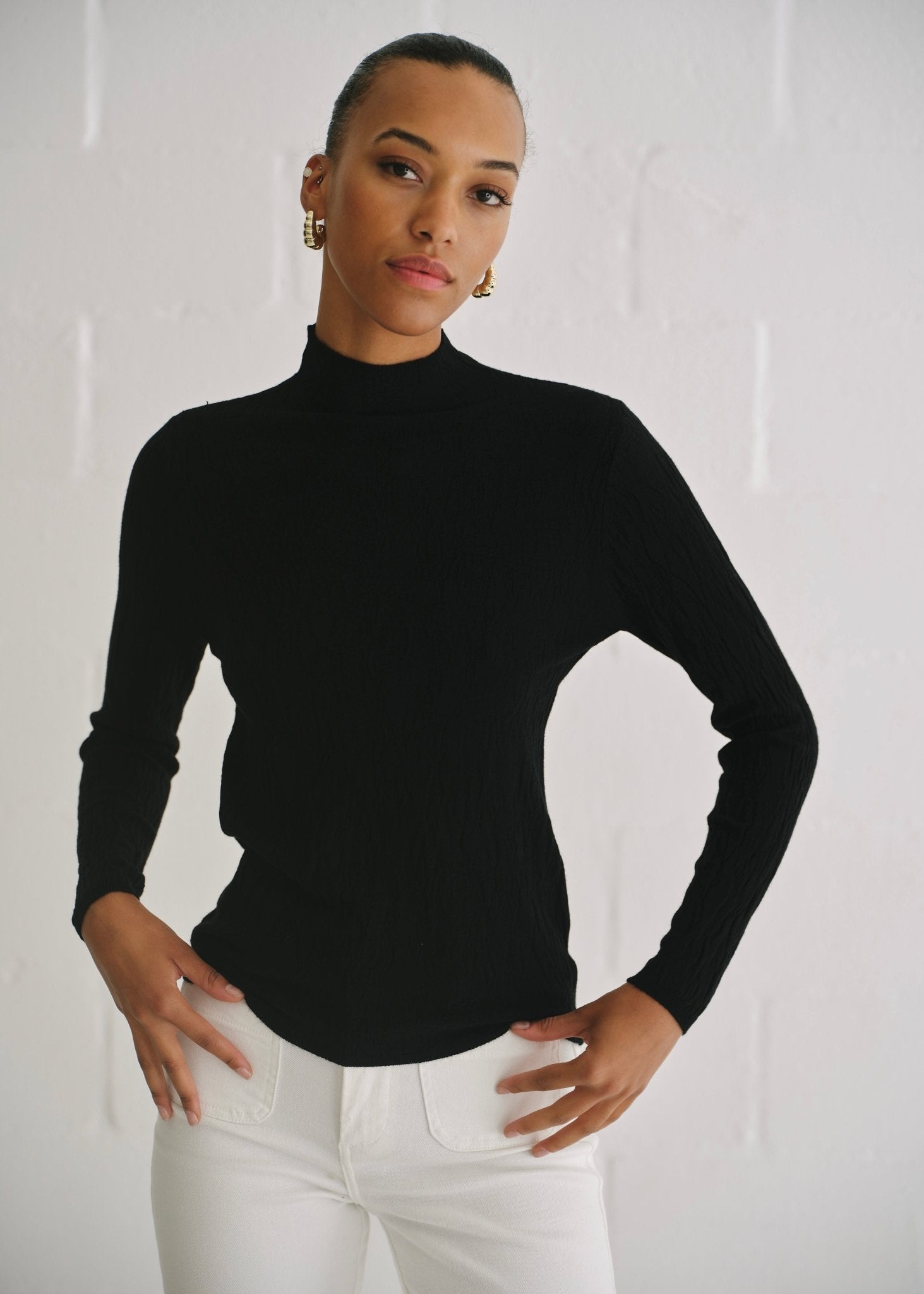 View our The Essential Black Embossed Turtleneck Knit - by Tribute Store
