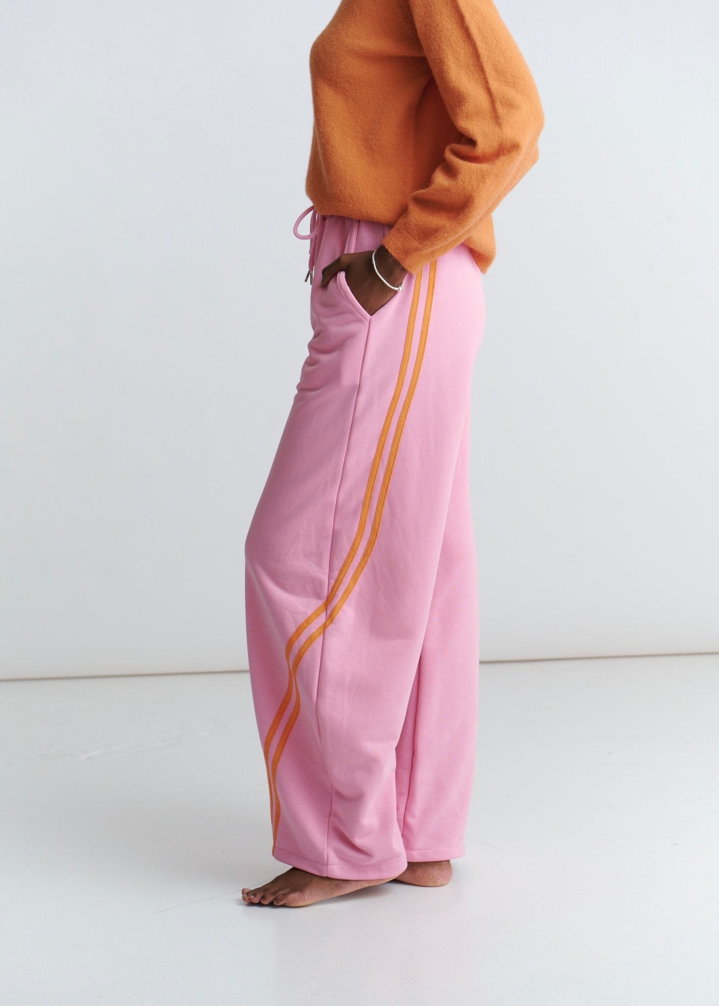 View our Tribeca Italian Cotton Barrel Track Pants In Pink and Orange - by Tribute Store