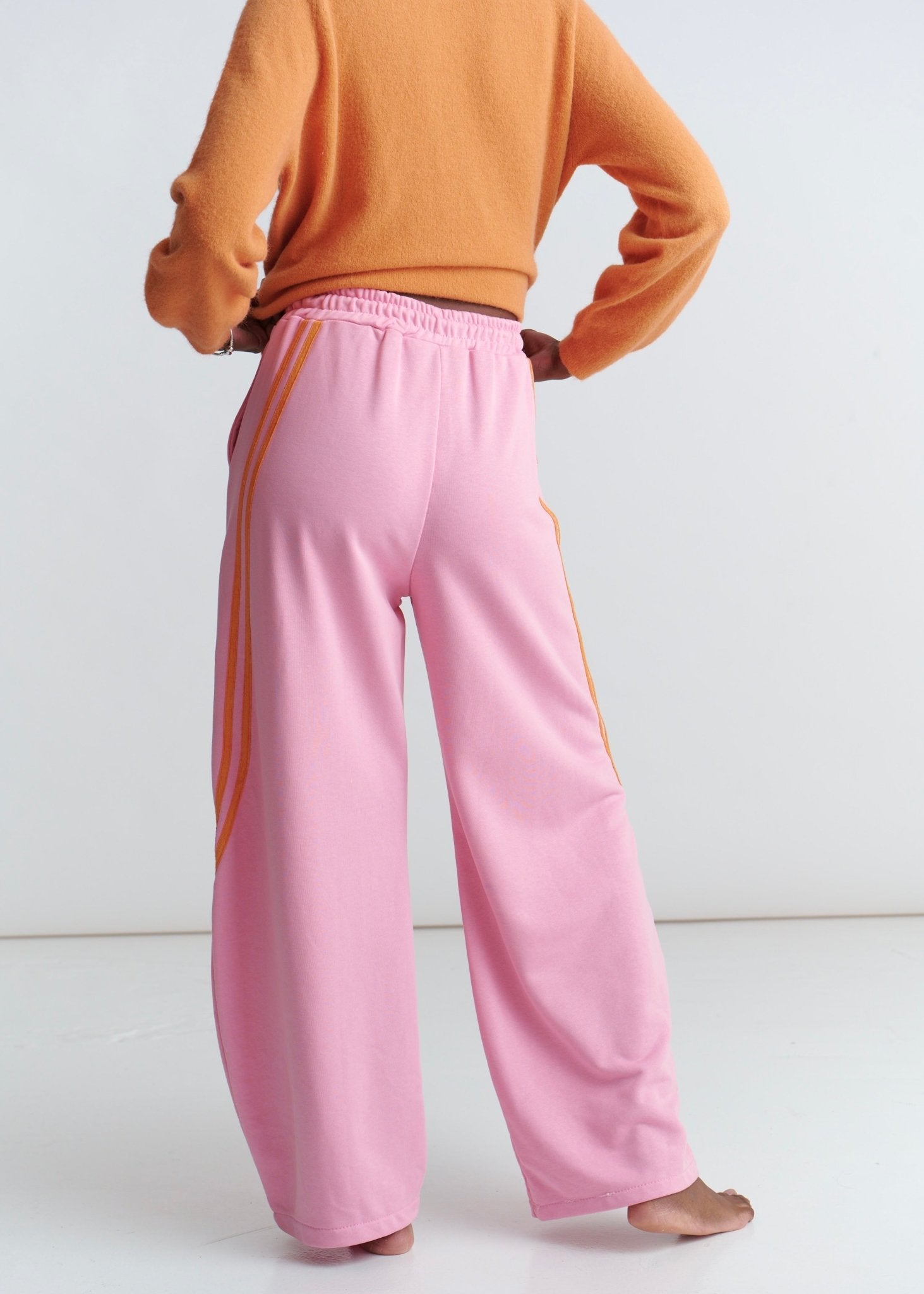 View our Tribeca Italian Cotton Barrel Track Pants In Pink and Orange - by Tribute Store