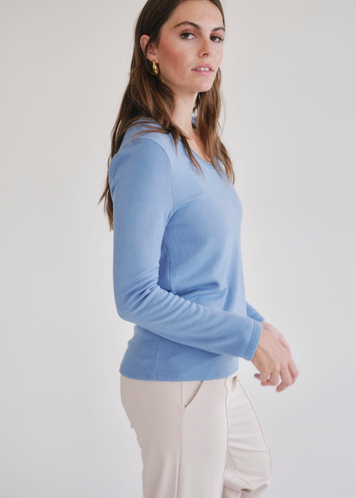 View our Winter V Neck with Gold Trim in Blue - by Tribute Store