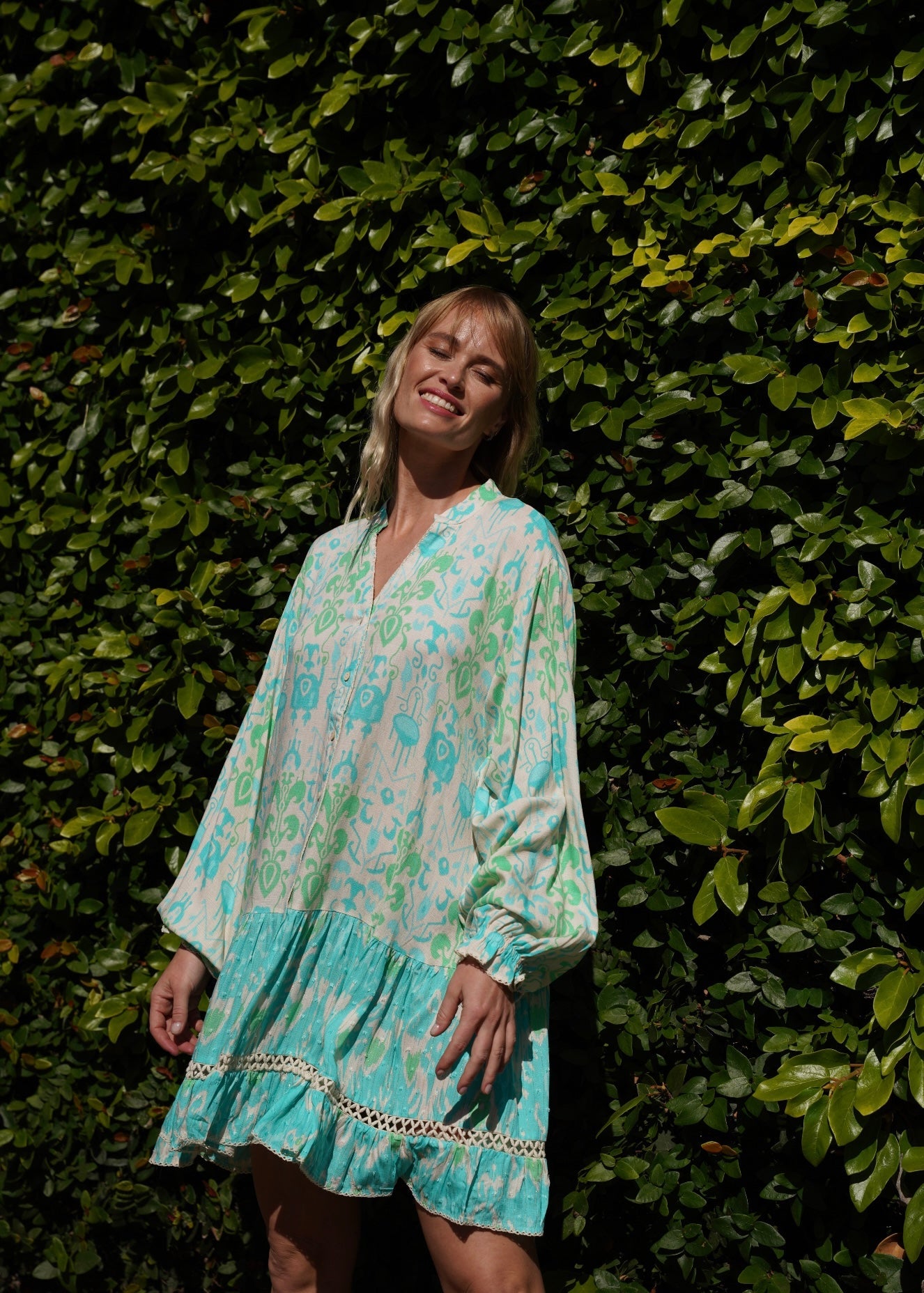 View our Zana Mini Dress With Mandarin Collar in Turquoise - by Tribute Store